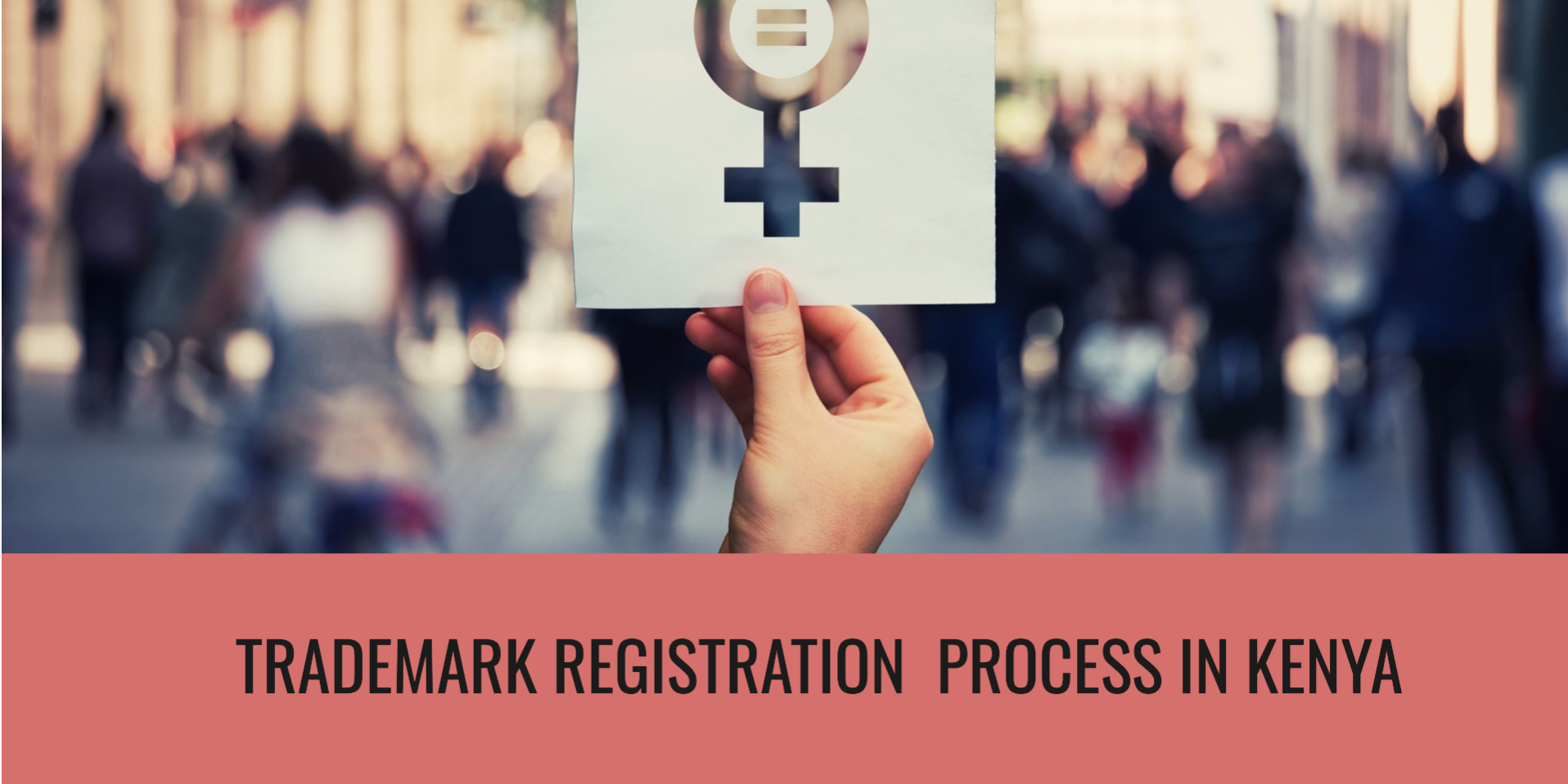 A Caucasian hand holding a gender equal sign - banner reads trademark registration process in Kenya | A Guide to Trademark Registration Process in Kenya | Njaga Advocates corporate commercial law