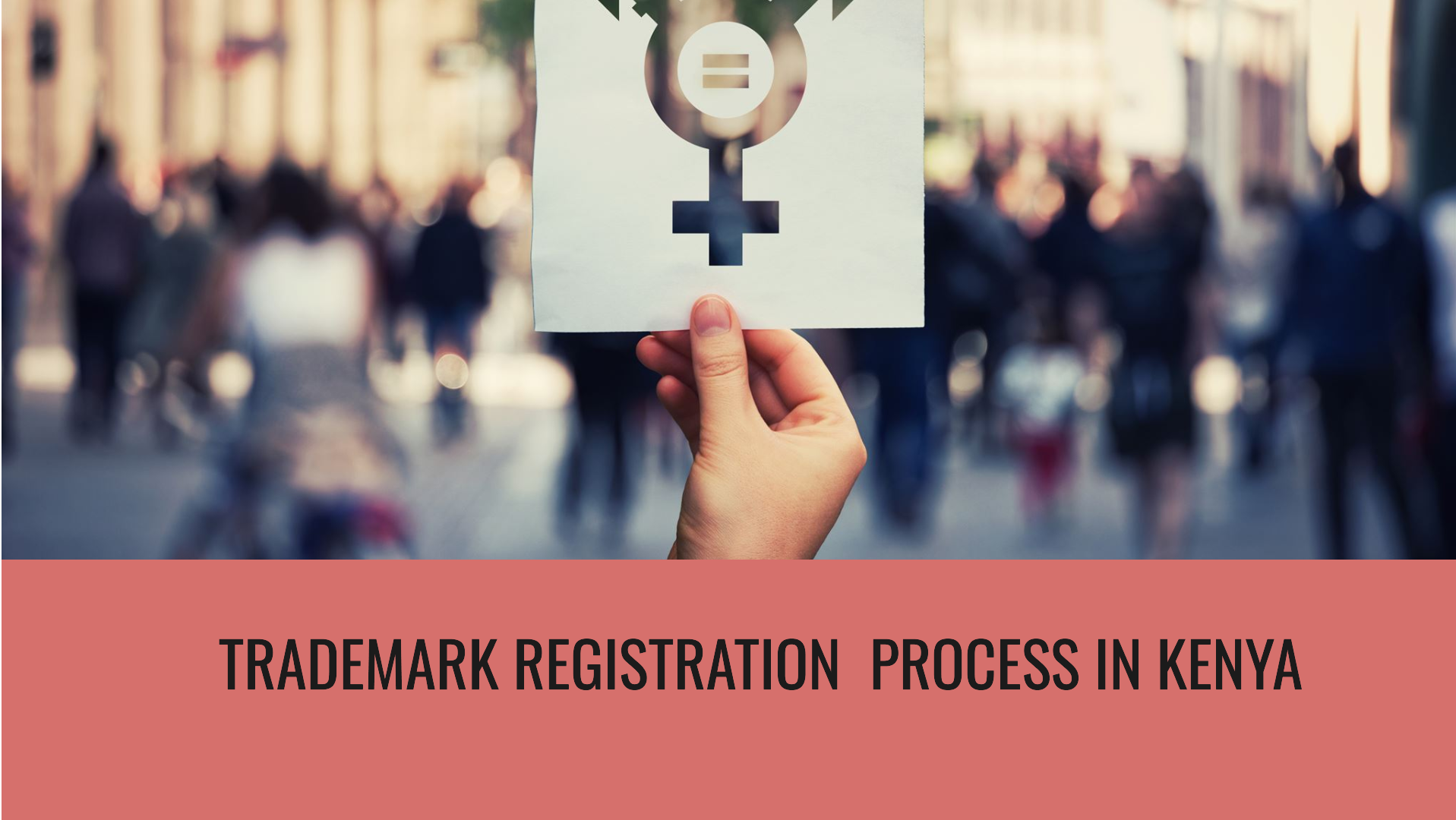 A Caucasian hand holding a gender equal sign - banner reads trademark registration process in Kenya | A Guide to Trademark Registration Process in Kenya | Njaga Advocates corporate commercial law