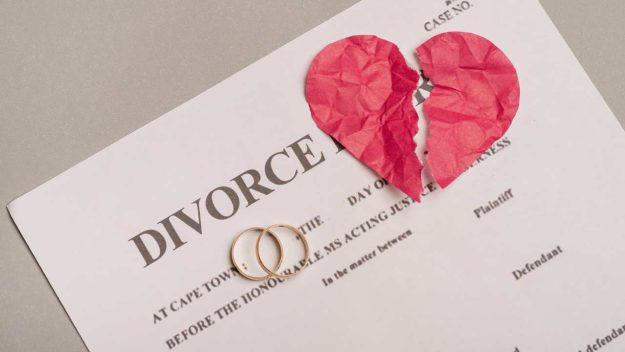 divorce by mutual consent two rings on a divorce form with paper heart broken in half | The Status of Divorce by Mutual Consent in Kenya After the High Court’s 2025 Judgment | Njaga & Co. Advocates LLP family lawyers in Nairobi