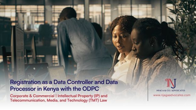 Two professional women reviewing documents on a laptop in a modern office, representing data controller and data processor registration guidance | Corporate & Commercial lawyer in Kenya| IP | TMT law